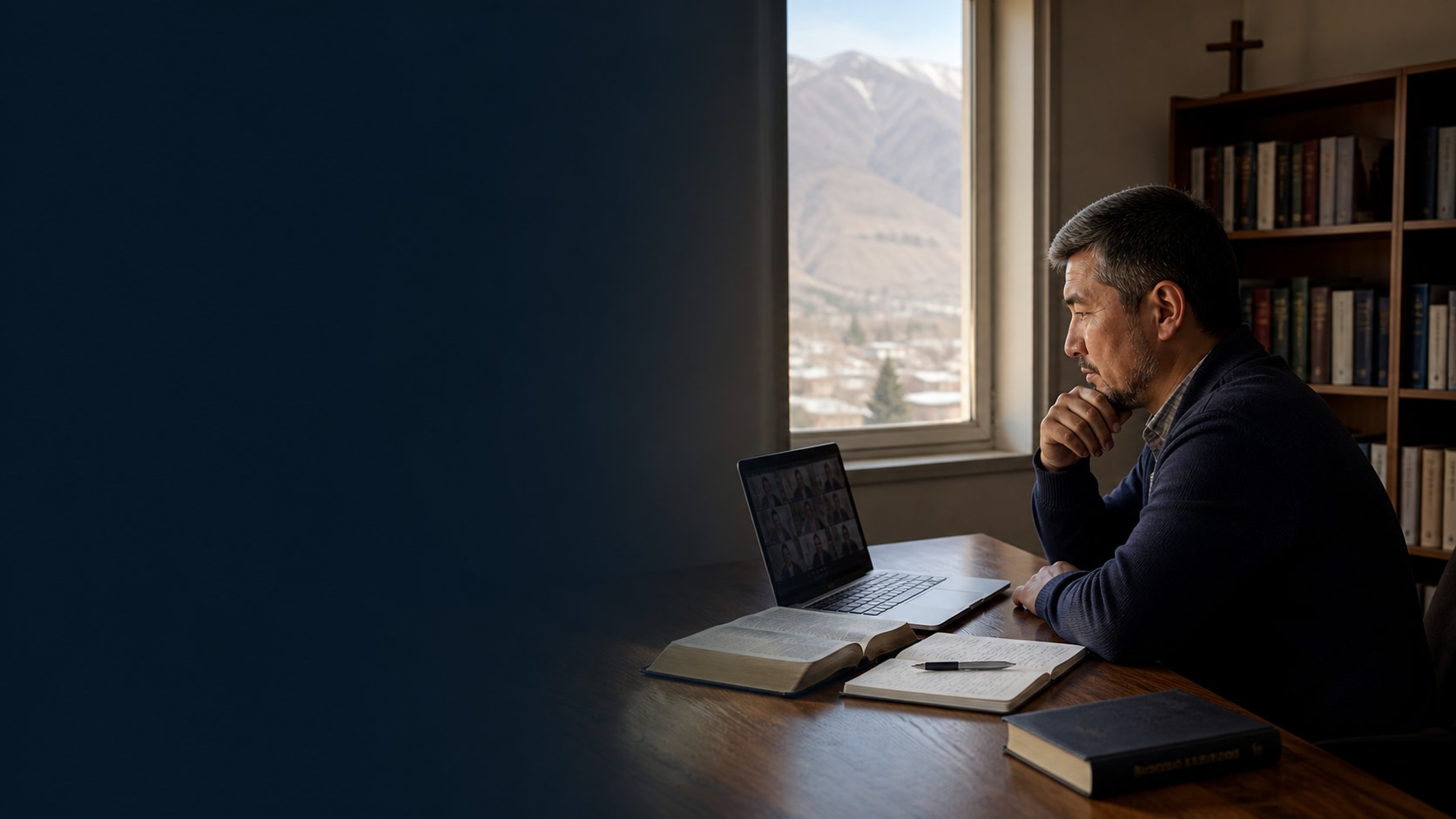 An adult learner studying Scripture from a modest apartment